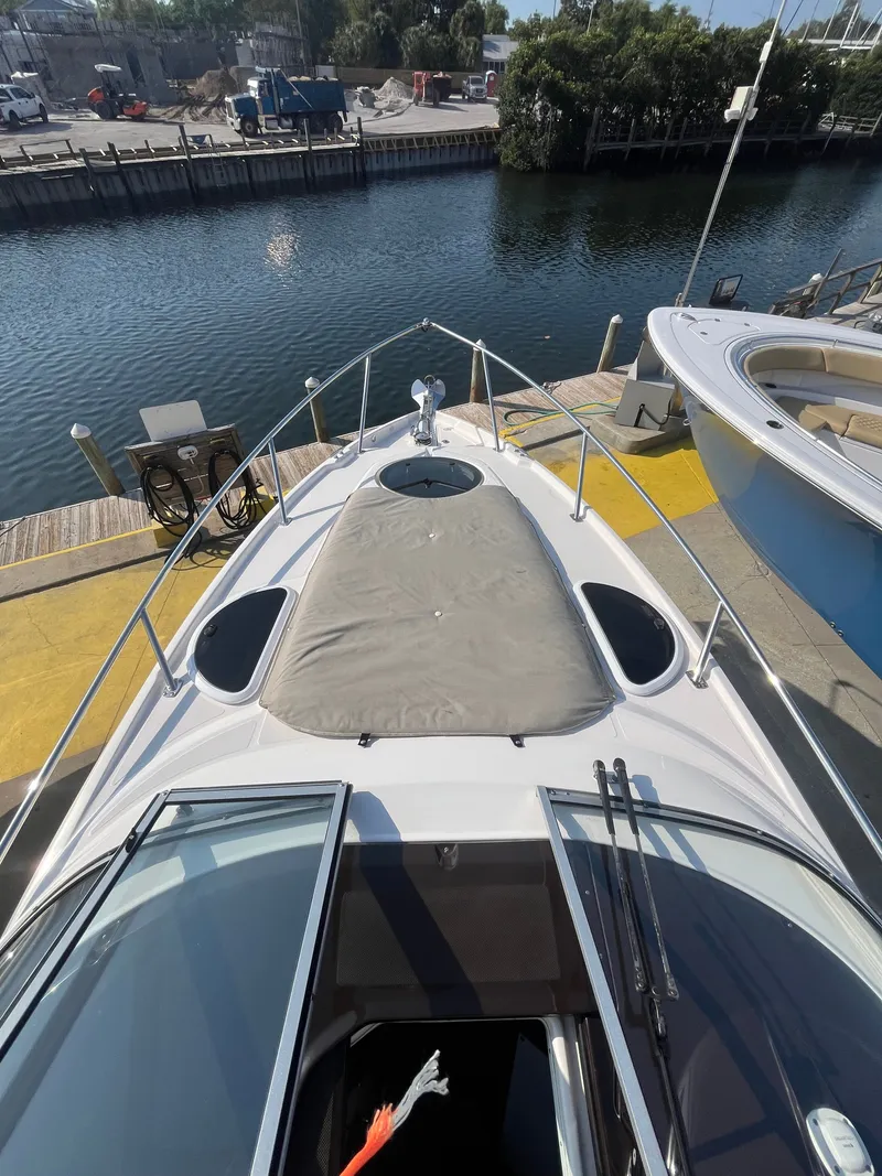 Slide: The Image of 2015 Regal 28 Express boat docked, aerial view. - 33