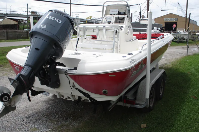 Slide: The Image of 2005 NauticStar 2200 NauticBay boat on trailer with Yamaha 200 outboard motor. - 4