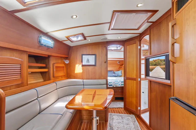 Slide: The Image of Luxurious interior of 2007 Sabre 42 Hard Top Express yacht with wood finish and cozy seating. - 22