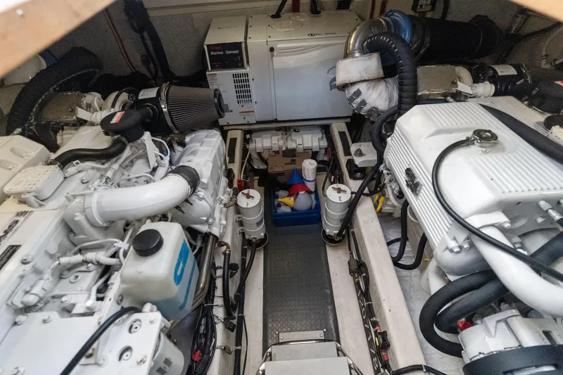 Slide: The Image of Engine room of a 2007 Sabre 42 Hard Top Express yacht, showcasing machinery and components. - 33