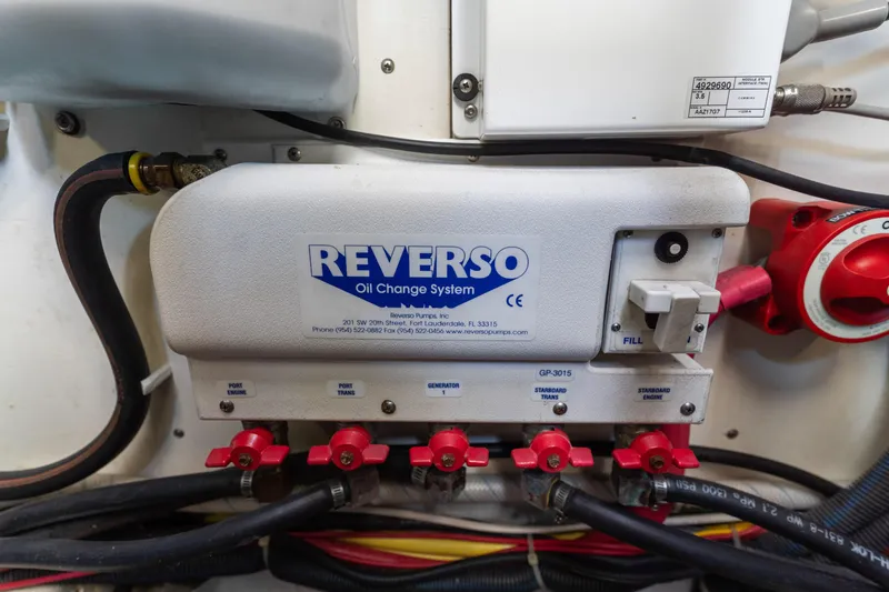 Slide: The Image of Reverso oil change system in 2007 Sabre 42 Hard Top Express boat engine compartment. - 34