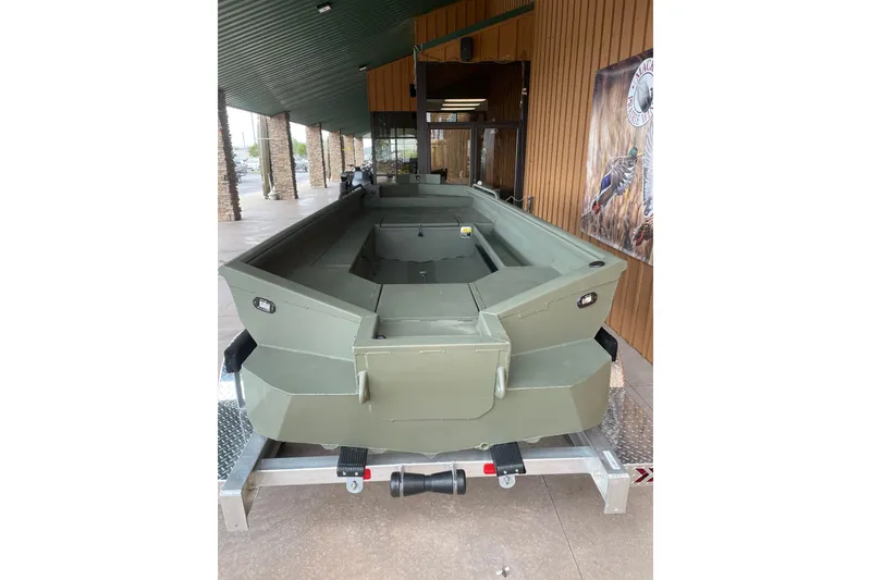 Slide: The Image of 2026 Reaper Boats 753 Timber Reaper in showroom, olive green finish. - 14