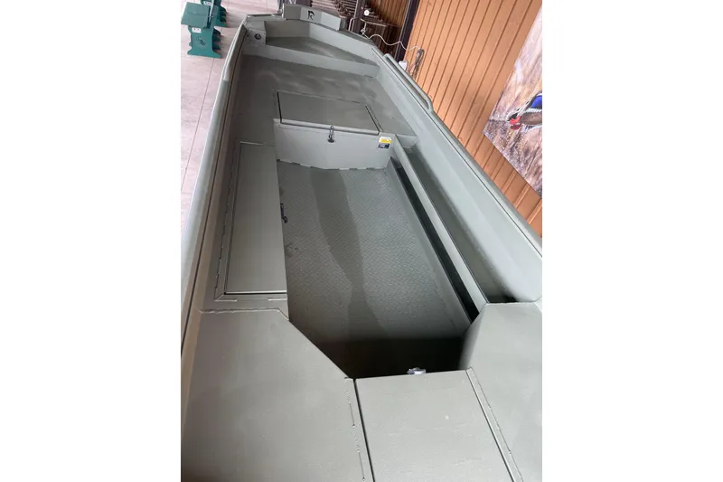 Slide: The Image of 2026 Reaper Boats 753 Timber Reaper interior view, showcasing spacious deck and storage compartments. - 3