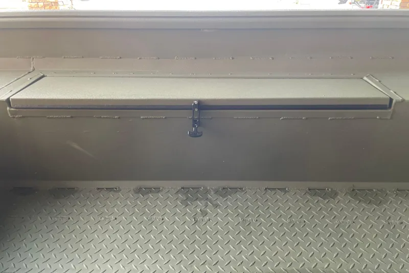 Slide: The Image of Interior view of 2026 Reaper Boats 753 Timber Reaper with diamond-patterned flooring. - 4