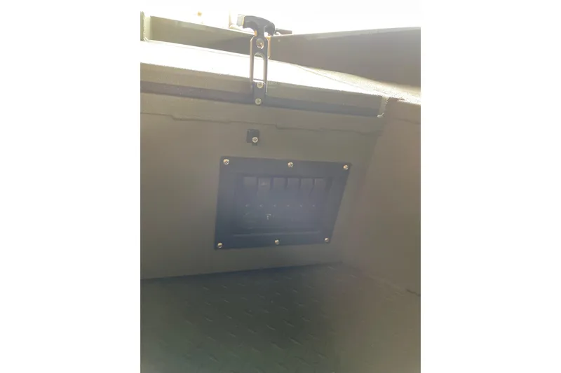 Slide: The Image of Interior view of 2026 Reaper Boats 753 Timber Reaper, featuring a control panel. - 5