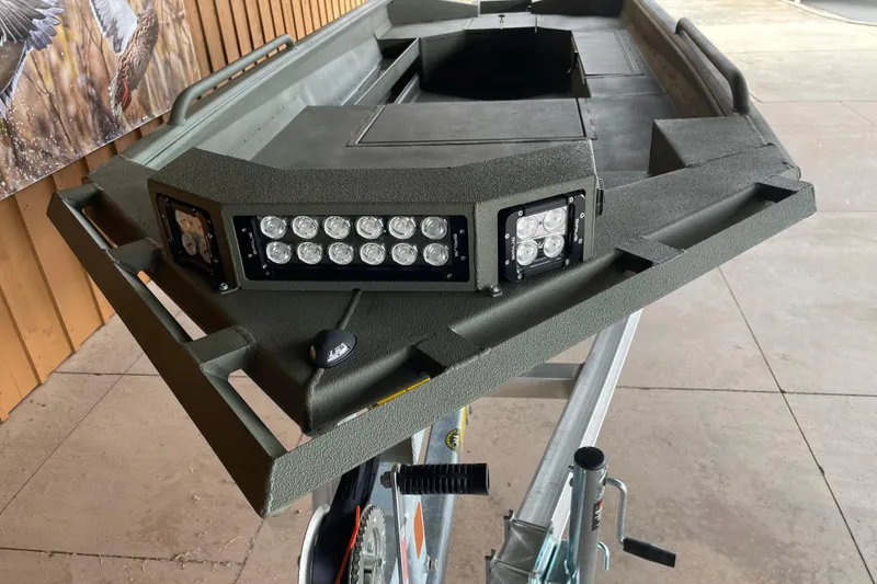 Slide: The Image of 2026 Reaper Boats 753 Timber Reaper with LED lights on display. - 9