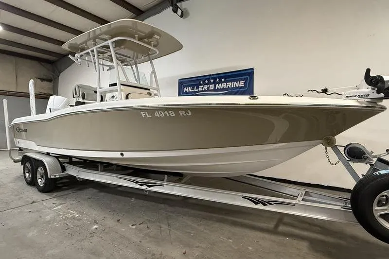 Slide: The Image of 2017 Crevalle 26 HCO boat on trailer at Miller's Marine showroom. - 1