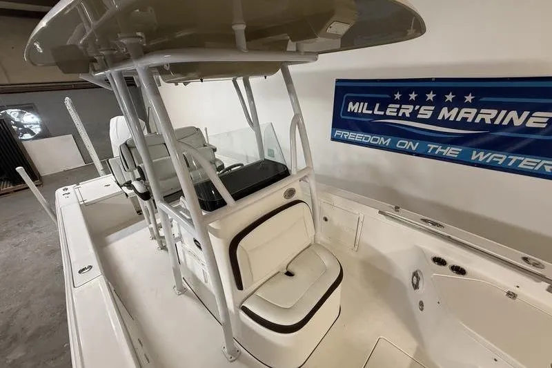 Slide: The Image of 2017 Crevalle 26 HCO boat interior at Miller's Marine showroom. - 15