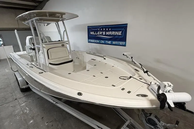 Slide: The Image of 2017 Crevalle 26 HCO boat on trailer at Miller's Marine showroom. - 2
