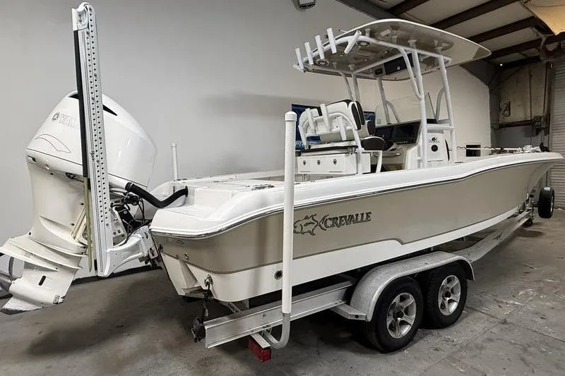 Slide: The Image of 2017 Crevalle 26 HCO boat on trailer in indoor storage. - 3
