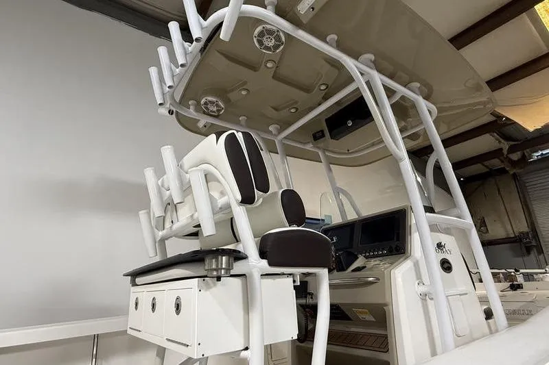 Slide: The Image of 2017 Crevalle 26 HCO boat interior with seating and control panel. - 8