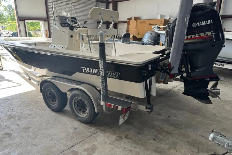 The Image of 2011 Pathfinder 2200 Tournament Edition boat with Yamaha outboard motor on trailer. - 0