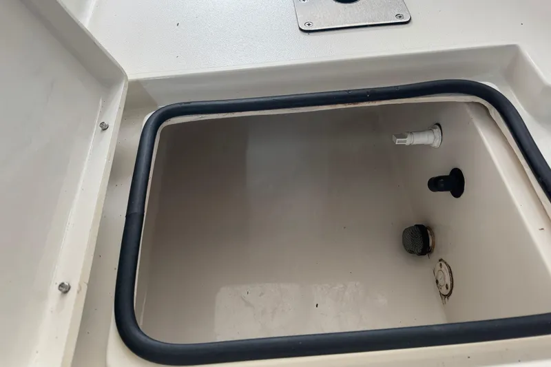 Slide: The Image of 2011 Pathfinder 2200 Tournament Edition boat compartment interior view. - 12