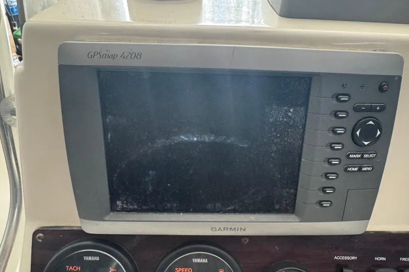 Slide: The Image of Garmin GPSmap 4208 on 2011 Pathfinder 2200 Tournament Edition boat dashboard. - 18