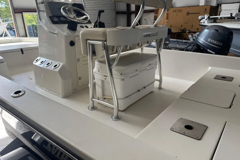 Slide: The Image of 2011 Pathfinder 2200 Tournament Edition boat interior with console and seating. - 26