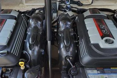 Slide: The Image of Twin engines of a 2017 Sea Ray SLX 310 boat, showcasing powerful performance. - 15