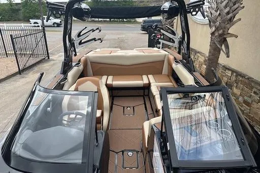 Slide: The Image of 2024 Supreme S220 boat interior with luxurious seating and modern design. - 13