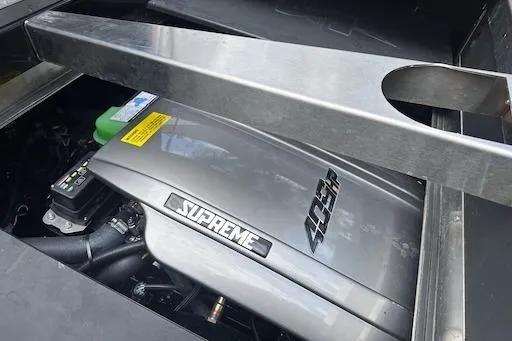 Slide: The Image of 2024 Supreme S220 engine compartment showcasing powerful machinery and sleek design. - 19