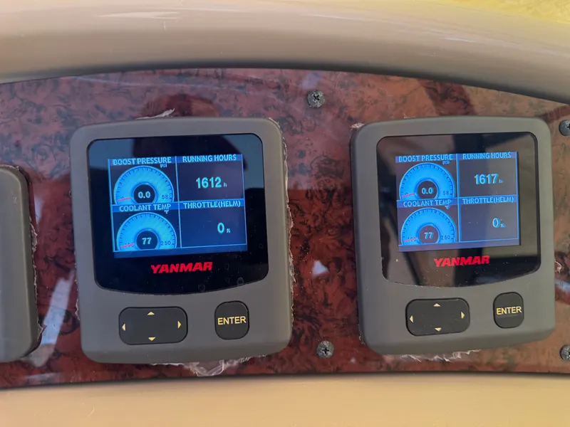 Slide: The Image of Yanmar engine displays on 1999 Sea Ray 380 Sundancer. - 11