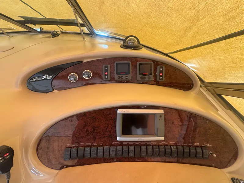 Slide: The Image of Dashboard of a 1999 Sea Ray 380 Sundancer yacht. - 12