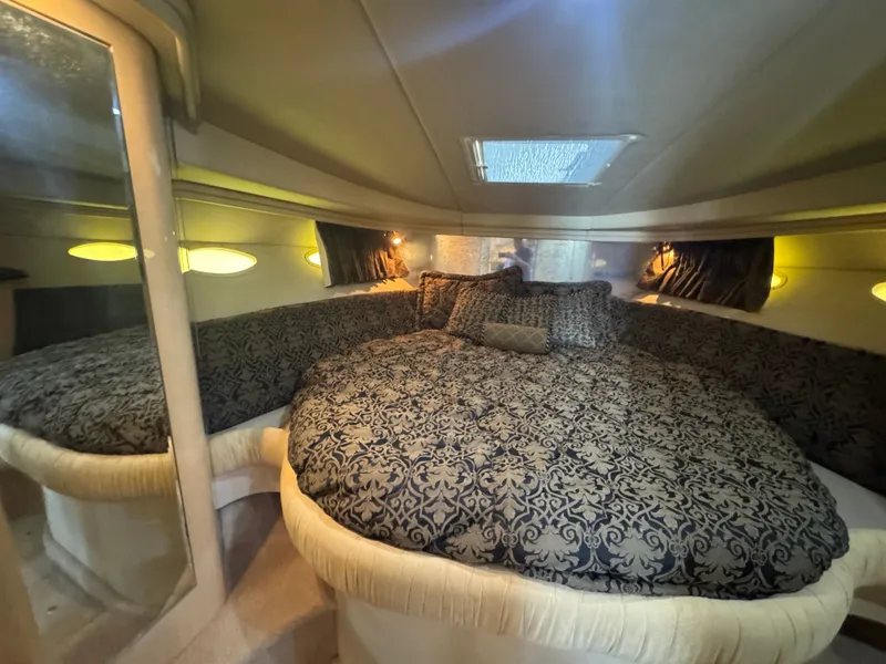 Slide: The Image of Luxurious cabin of the 1999 Sea Ray 380 Sundancer. - 24