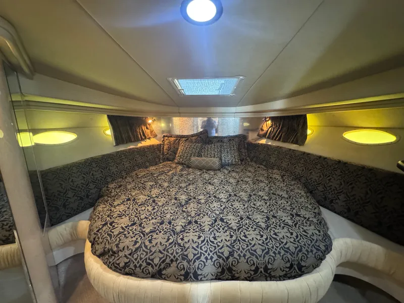Slide: The Image of Luxurious cabin of the 1999 Sea Ray 380 Sundancer. - 27