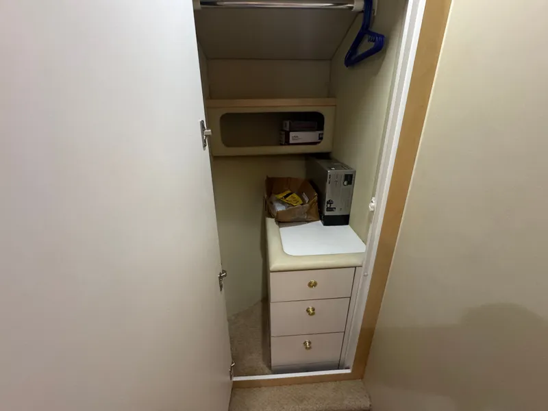 Slide: The Image of Cabinet in 1999 Sea Ray 380 Sundancer with drawers and shelf. - 30