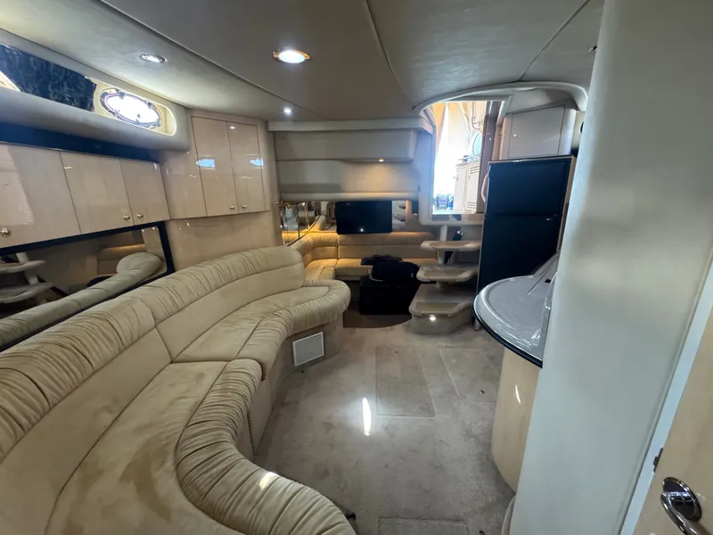 Slide: The Image of Interior of a 1999 Sea Ray 380 Sundancer yacht, luxurious and spacious. - 42
