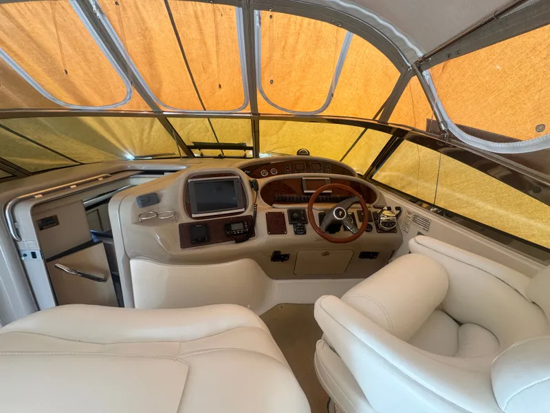 Slide: The Image of Interior of 1999 Sea Ray 380 Sundancer with cockpit view. - 6