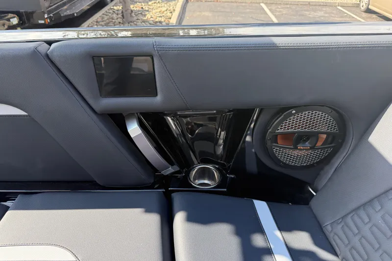 Slide: The Image of 2024 MasterCraft X24 interior with speaker and sleek seating design. - 22