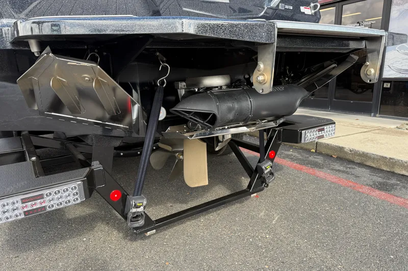 Slide: The Image of 2024 MasterCraft X24 boat trailer with propeller and rear view details. - 8