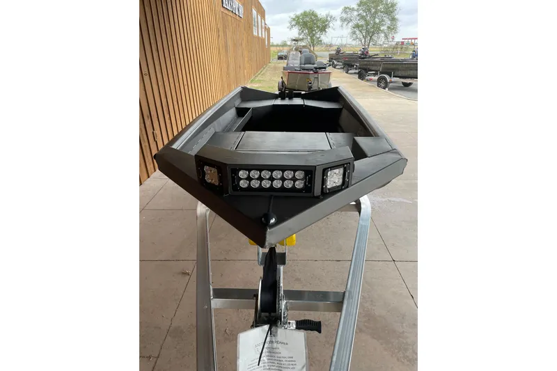 Slide: The Image of Interior view of 2026 Reaper Boats 550 Timber Reaper with textured flooring. - 10