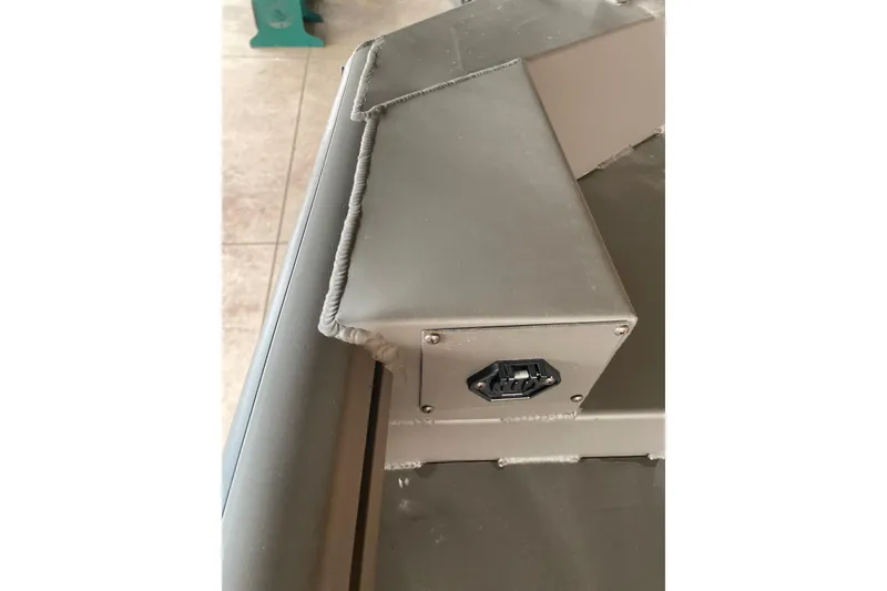 Slide: The Image of Close-up of 2026 Reaper Boats 550 Timber Reaper's metal corner detail. - 12