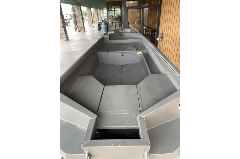 Slide: The Image of 2026 Reaper Boats 550 Timber Reaper, sleek design, outdoor display. - 8