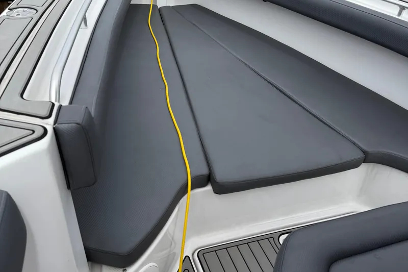 Slide: The Image of 2008 Donzi 32 ZF Open boat interior with cushioned seating and yellow cable. - 29