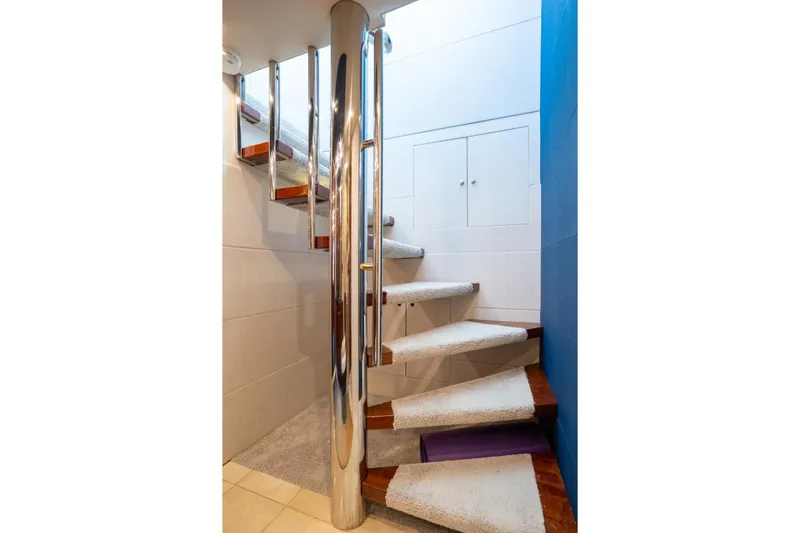 Slide: The Image of Staircase with modern design inside a 2001 Lazzara Motoryacht. - 46