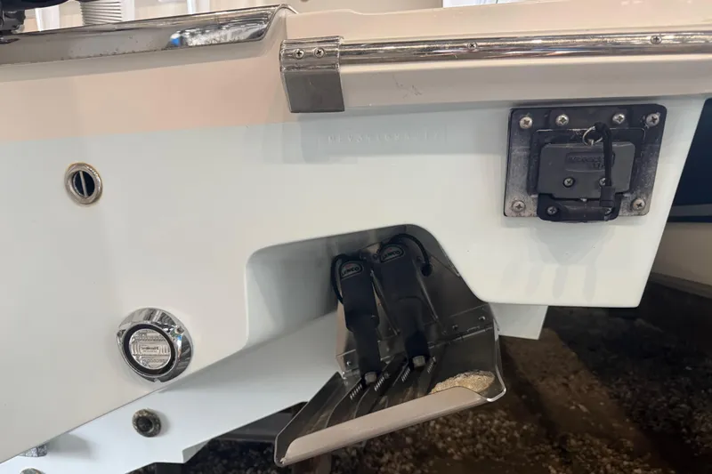 Slide: The Image of 2012 Jupiter 34 FS boat transom with trim tabs and fittings. - 13