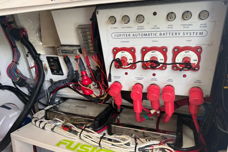 Slide: The Image of 2012 Jupiter 34 FS boat's automatic battery system with wiring and controls. - 30