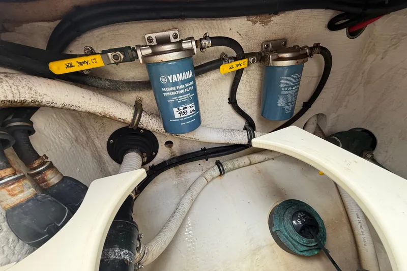 Slide: The Image of Engine compartment of a 2012 Jupiter 34 FS with Yamaha fuel/water separators. - 32