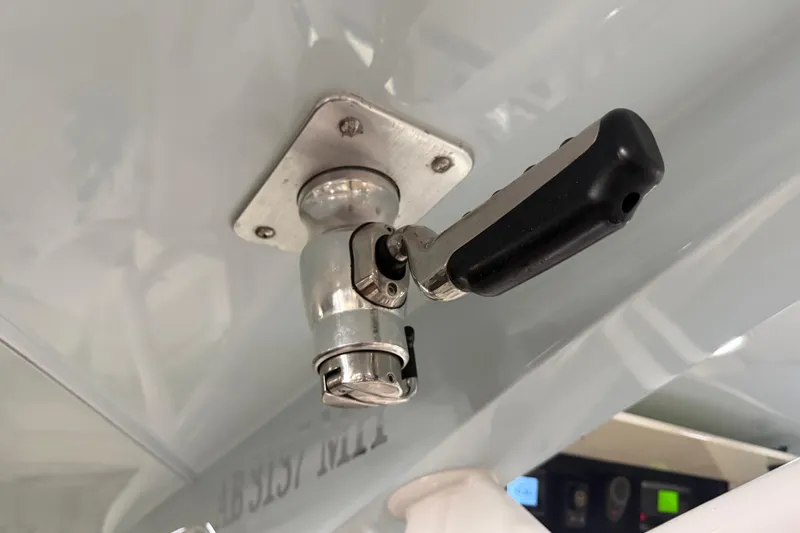 Slide: The Image of Close-up of a 2012 Jupiter 34 FS boat handle mechanism. - 37