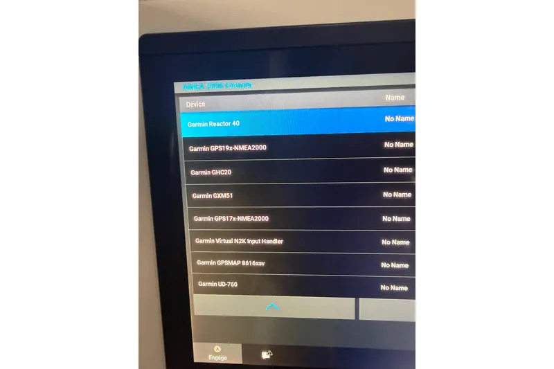 Slide: The Image of Screen displaying Garmin NMEA 2000 devices on a 2012 Jupiter 34 FS boat. - 40