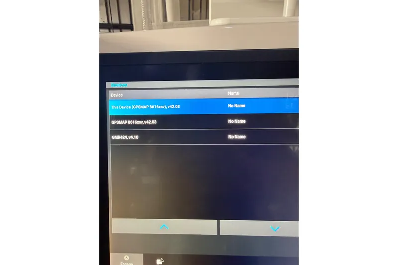 Slide: The Image of Display screen showing device list on a 2012 Jupiter 34 FS boat. - 41