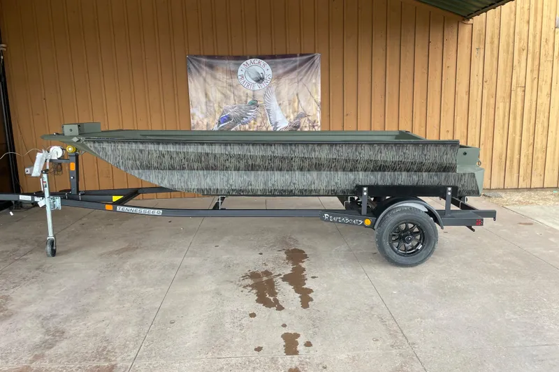 The Image of 2026 Reaper Boats 653 Timber Reaper on trailer, displayed outdoors. - 1