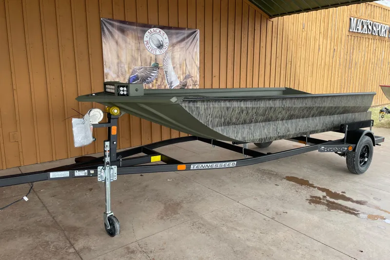 Slide: The Image of 2026 Reaper Boats 653 Timber Reaper on trailer at Mack's Prairie Wings store. - 13