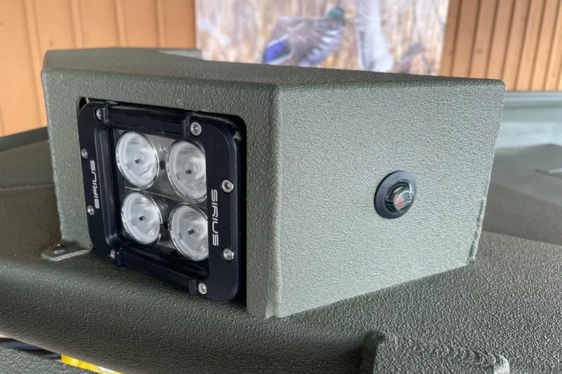 Slide: The Image of Close-up of Sirius LED light on 2026 Reaper Boats 653 Timber Reaper. - 5