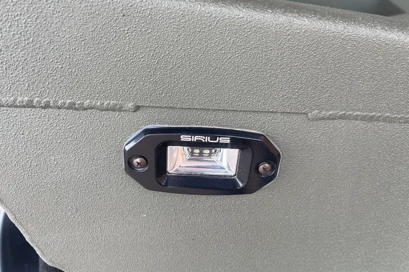 Slide: The Image of Close-up of Sirius light on 2026 Reaper Boats 653 Timber Reaper. - 7