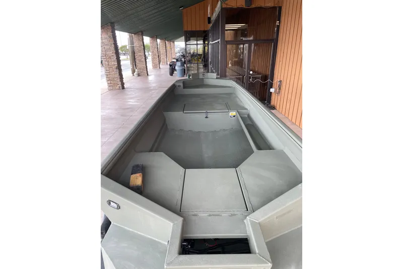 Slide: The Image of 2026 Reaper Boats 653 Timber Reaper, displayed outdoors, showcasing spacious interior design. - 9