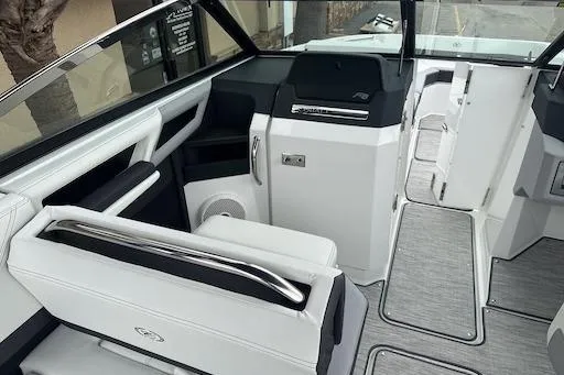 Slide: The Image of 2024 Cobalt R8 boat interior with sleek seating and modern dashboard design. - 10