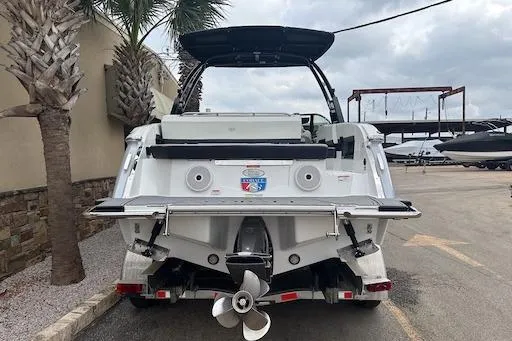 Slide: The Image of 2024 Cobalt R8 boat rear view, showcasing sleek design and powerful propeller. - 5