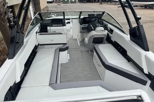 Slide: The Image of 2024 Cobalt R8 boat interior with sleek seating and modern dashboard design. - 9